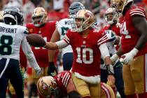 San Francisco 49ers quarterback Jimmy Garoppolo (10) reacts during the second half of an NFL fo ...