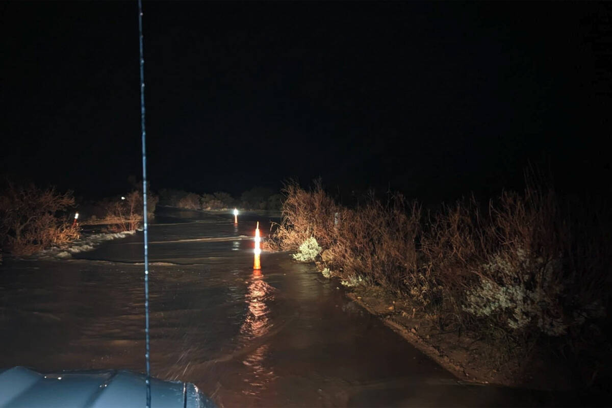 This photo from the Bureau of Land Management shows flooding at Oak Creek at Red Rock Canyon Na ...