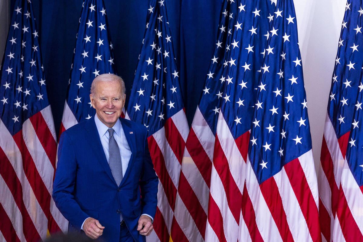 President Joe Biden arrives to talk about lowering prescription drug costs during a speech in t ...