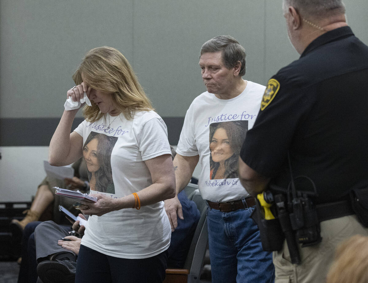 Cindy Peters, left, and her husband Mark, parent of Rebekah Peters, a murder victim, prepare to ...