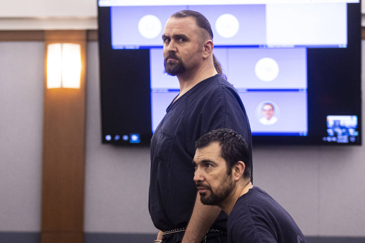 Joshua Nichols prepares to enter a guilty plea for 2020 robbery charges on Wednesday, March 15, ...