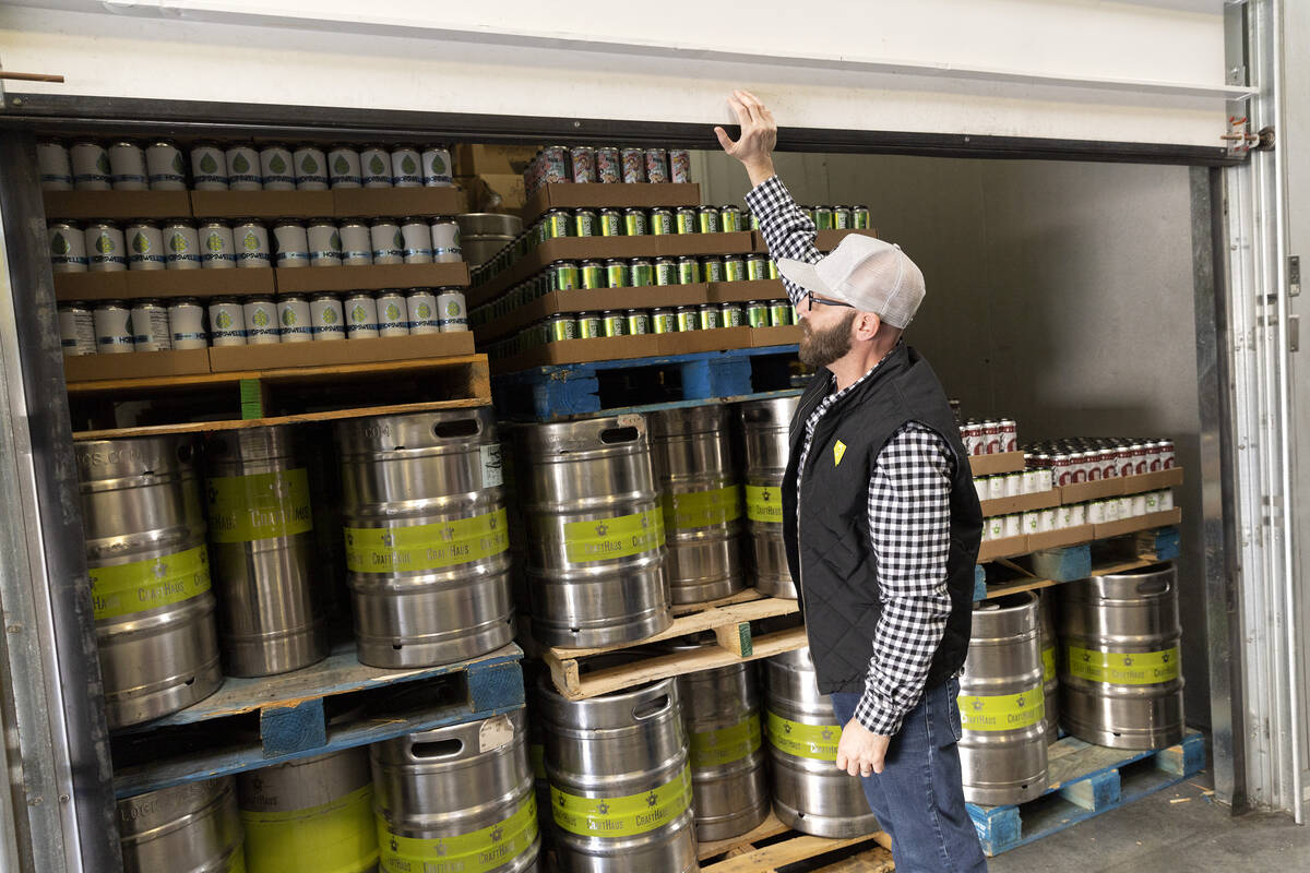 Co-owner and founder of CraftHaus Dave Forrest shows their warehouse stock of product at CraftH ...