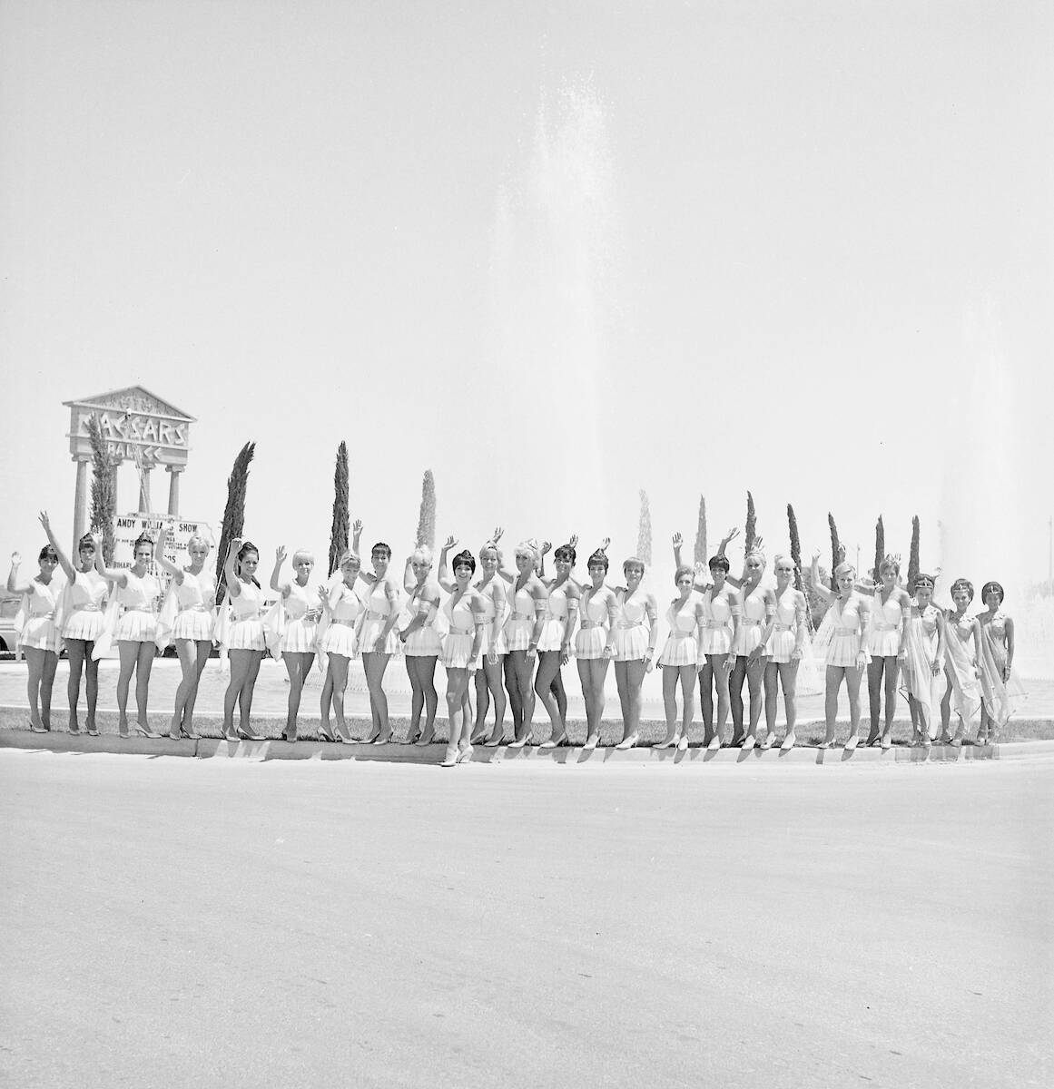 "Goddesses" cocktail waitresses stand by the fountain prior to the grand opening of Caesars Pal ...