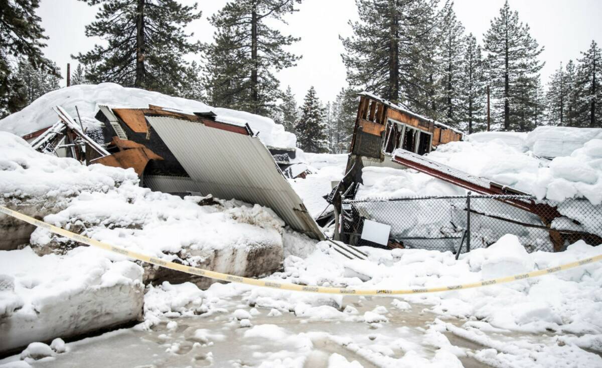 A collapsed building due to the recent snow storms is seen near Dollar Point, Calif. Tuesday, M ...