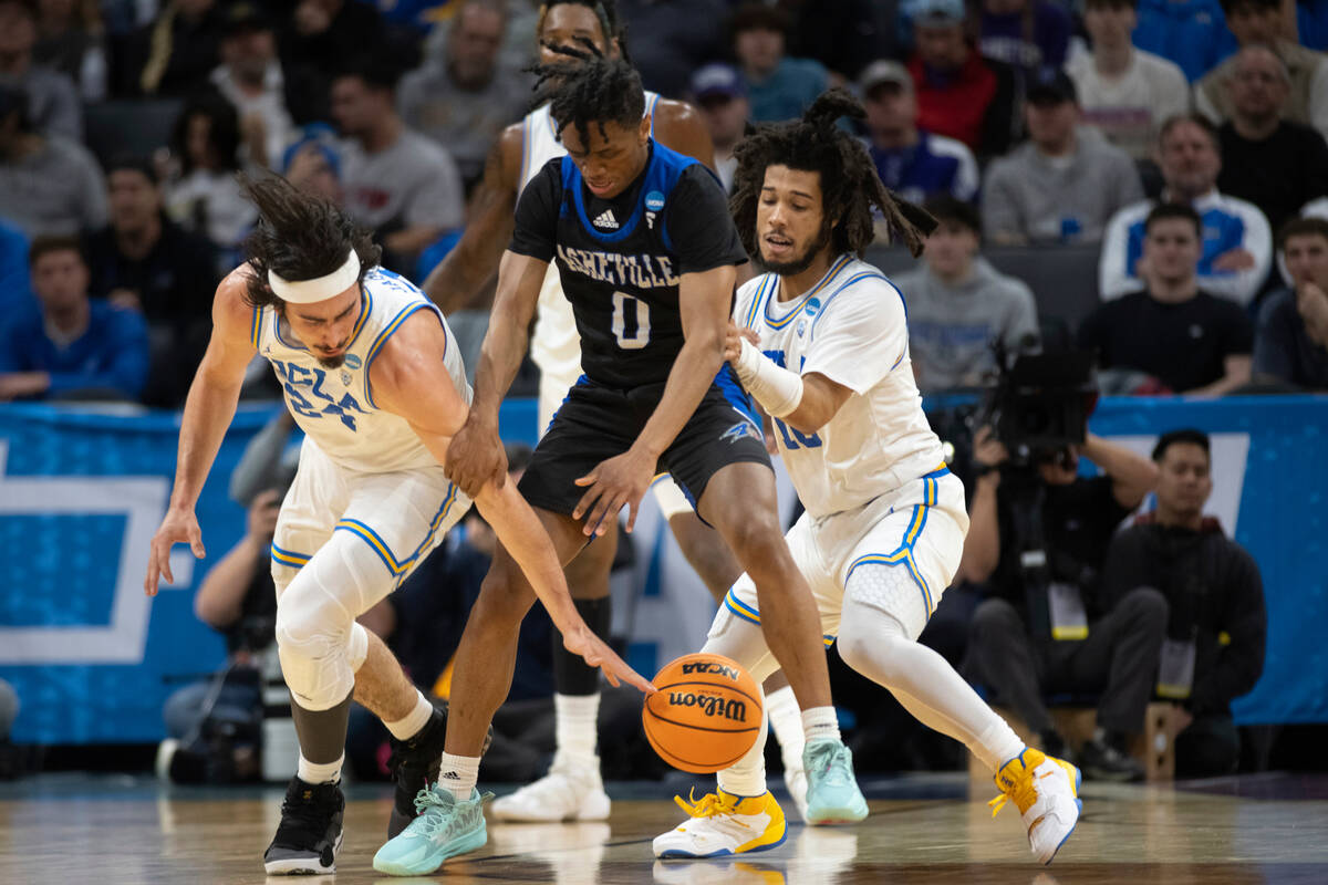 UNC Asheville guard Trent Stephney (0) has the ball taken away by UCLA guard Jaime Jaquez Jr. ( ...