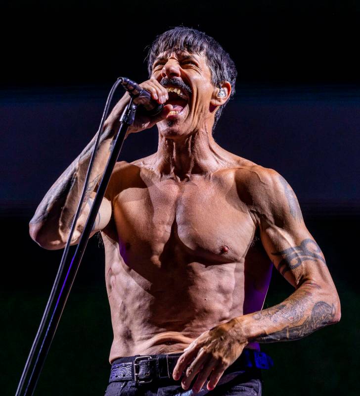 Lead singer Anthony Kiedis performs with The Red Hot Chili Peppers at Allegiant Stadium on Satu ...