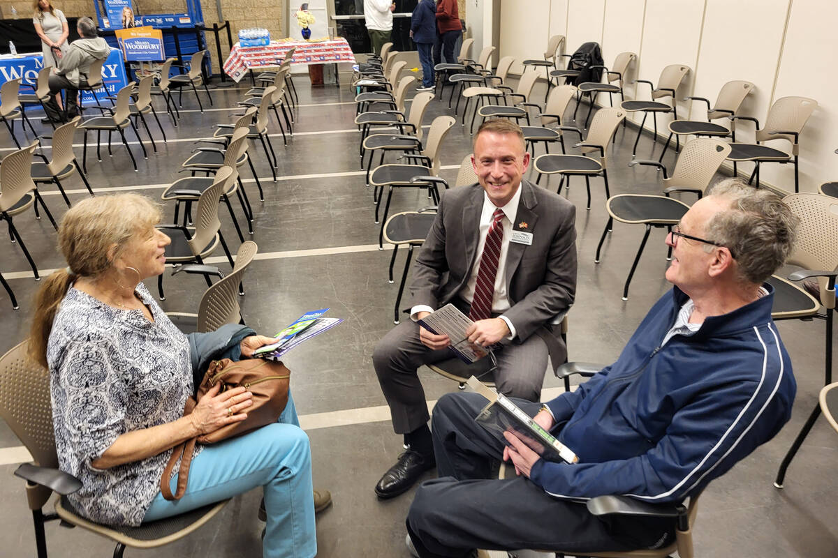 Nancy Olds (left) and Richard Pupko (right) talking to Aaron Johnson (center). (Mark Credico/La ...
