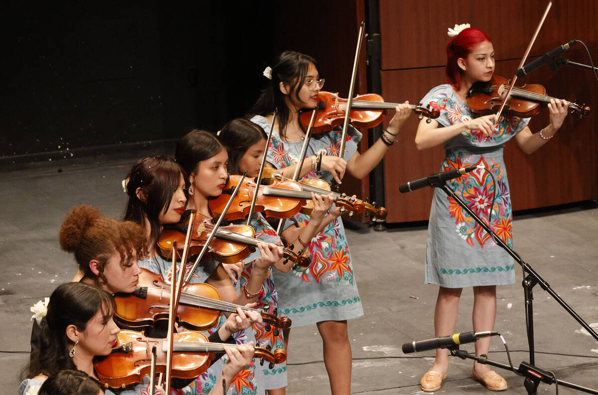 Members of the Las Vegas Academy of the Arts Mariachi Nacional group perform during Mariachi Sp ...