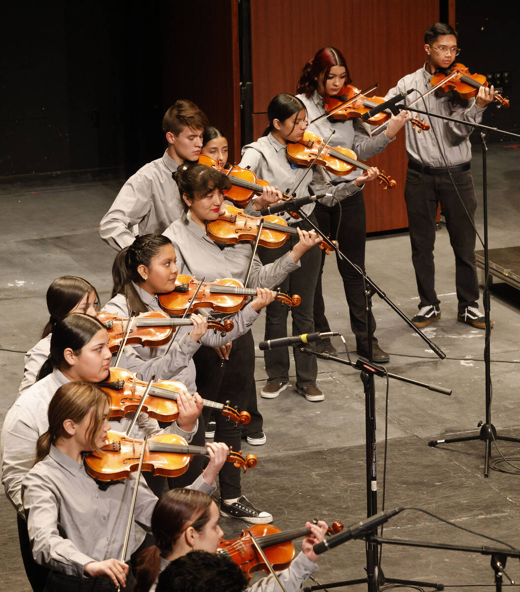 Members of the Las Vegas Academy of the Arts Mariachi Regional group perform during Mariachi Sp ...