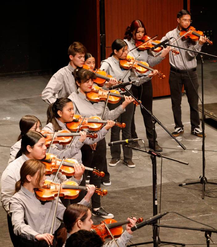 Members of the Las Vegas Academy of the Arts Mariachi Regional group perform during Mariachi Sp ...