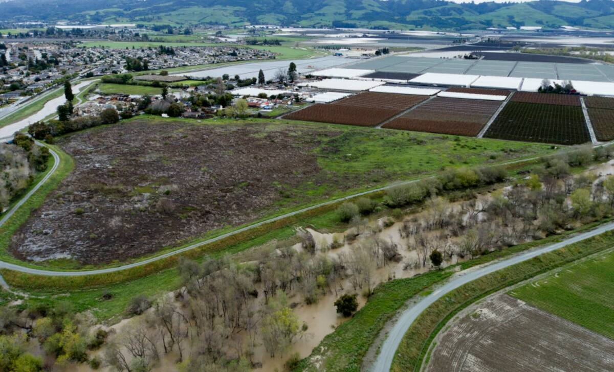 This photo shows a flooded Pajaro River area in Pajaro, Calif. on Tuesday, March 14, 2023. (Cal ...