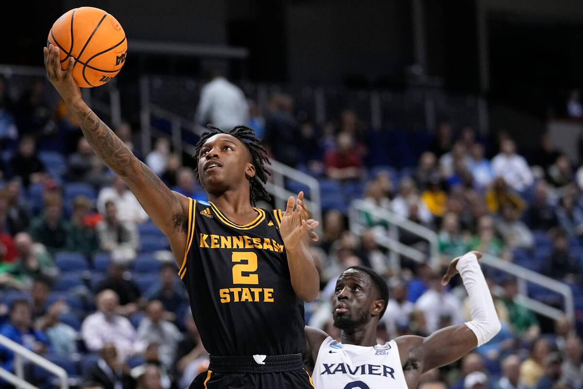 Kennesaw State guard Simeon Cottle (2) goes in for a short as Xavier's Souley Boum (0) defends ...