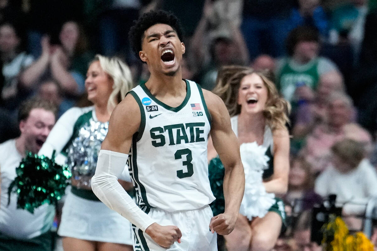 Michigan State guard Jaden Akins (3) celebrates being fouled on a basket against Southern Calif ...
