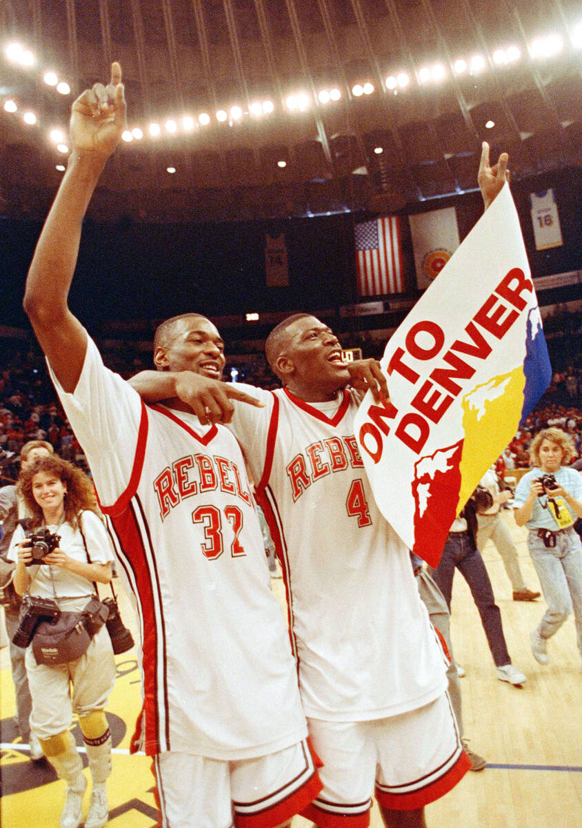 UNLV forwards Stacey Augmon, left, and Larry Johnson celebrate their win over Loyola Marymount ...