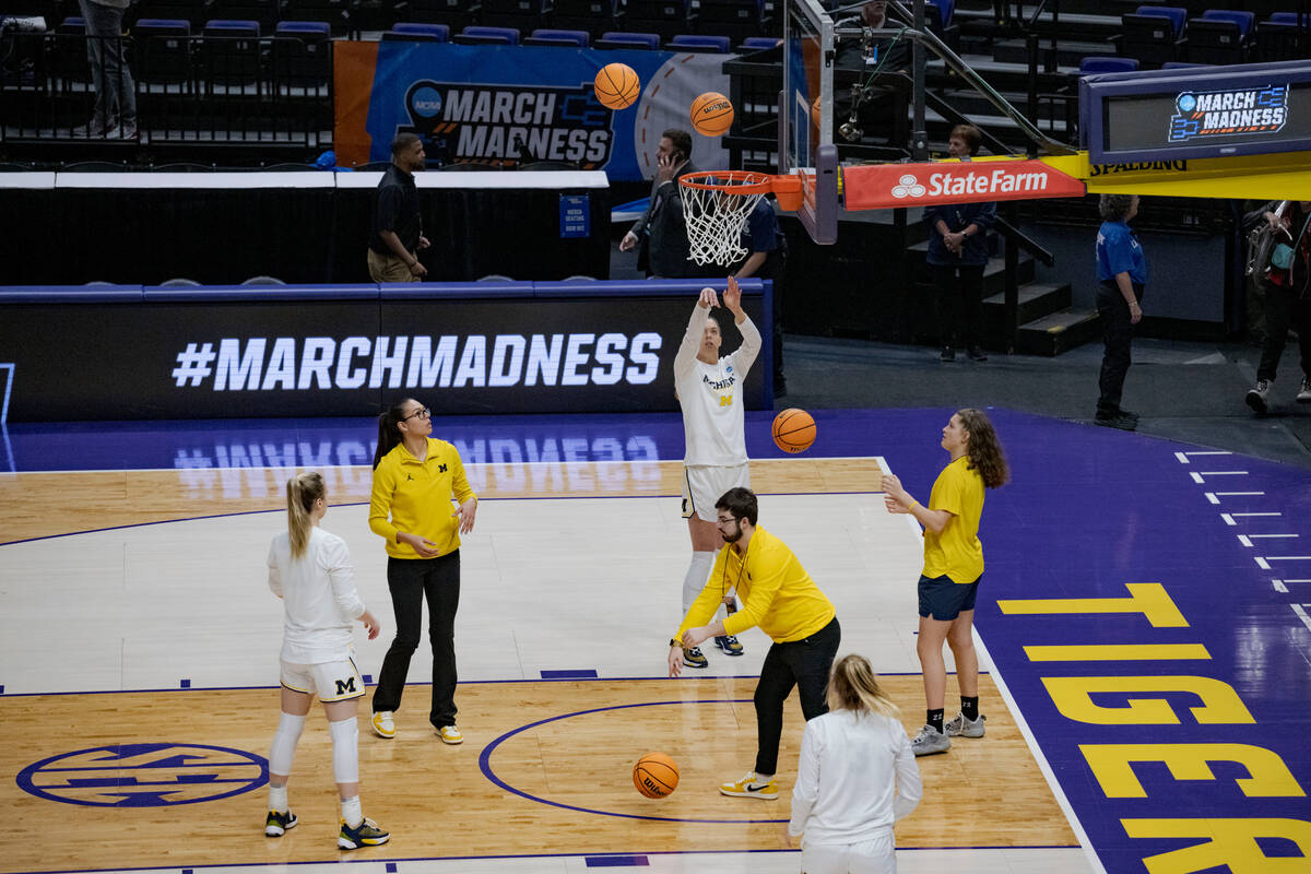 Michigan warm ups before a first-round college basketball game against UNLV in the women's NCAA ...