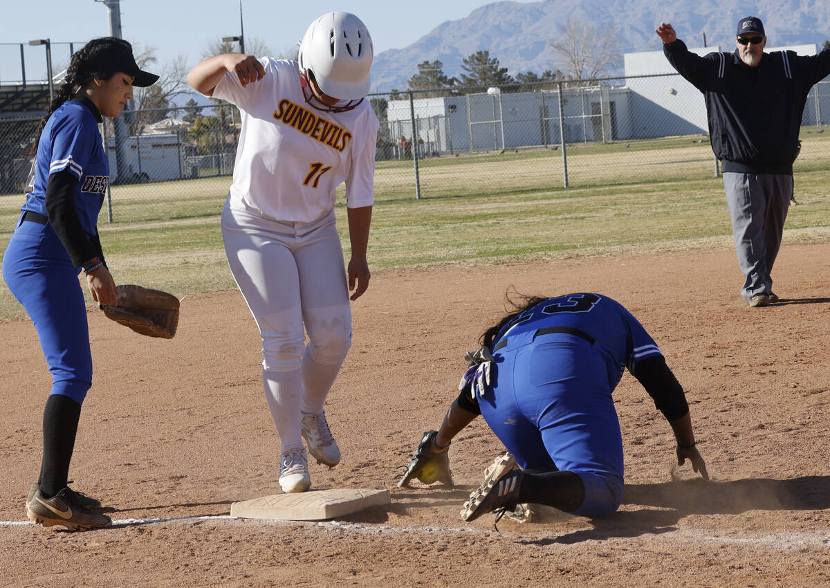 Desert Pines' Jocelyn Galvez Cruz (23) is late with the tag as Eldorado's Tania Rubio (11) safe ...