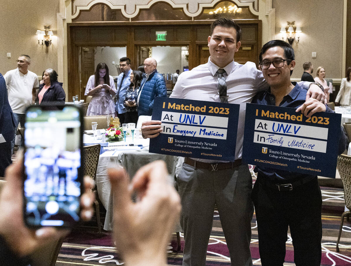 Luis Sanchez, left, and Terrence Sanvictores pose for a photo after learning where they are acc ...