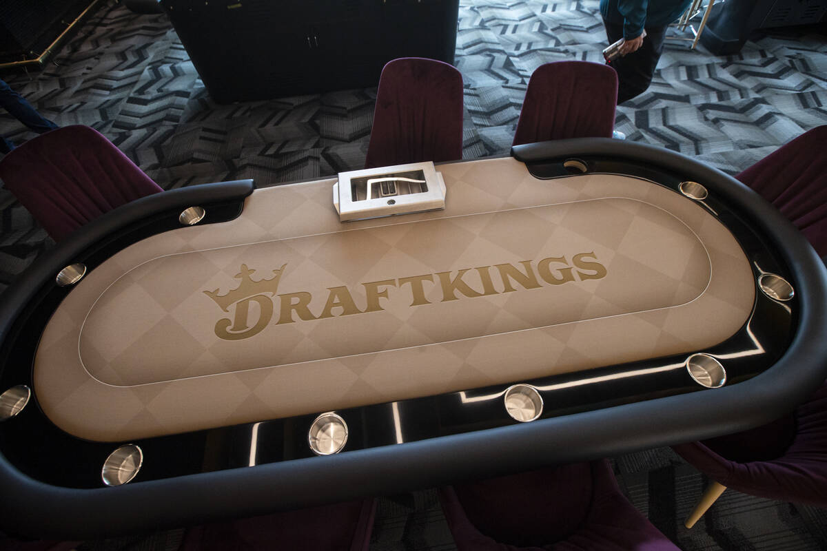 A poker table in the casino area is pictured during a tour of DraftKings' new offices at UnComm ...