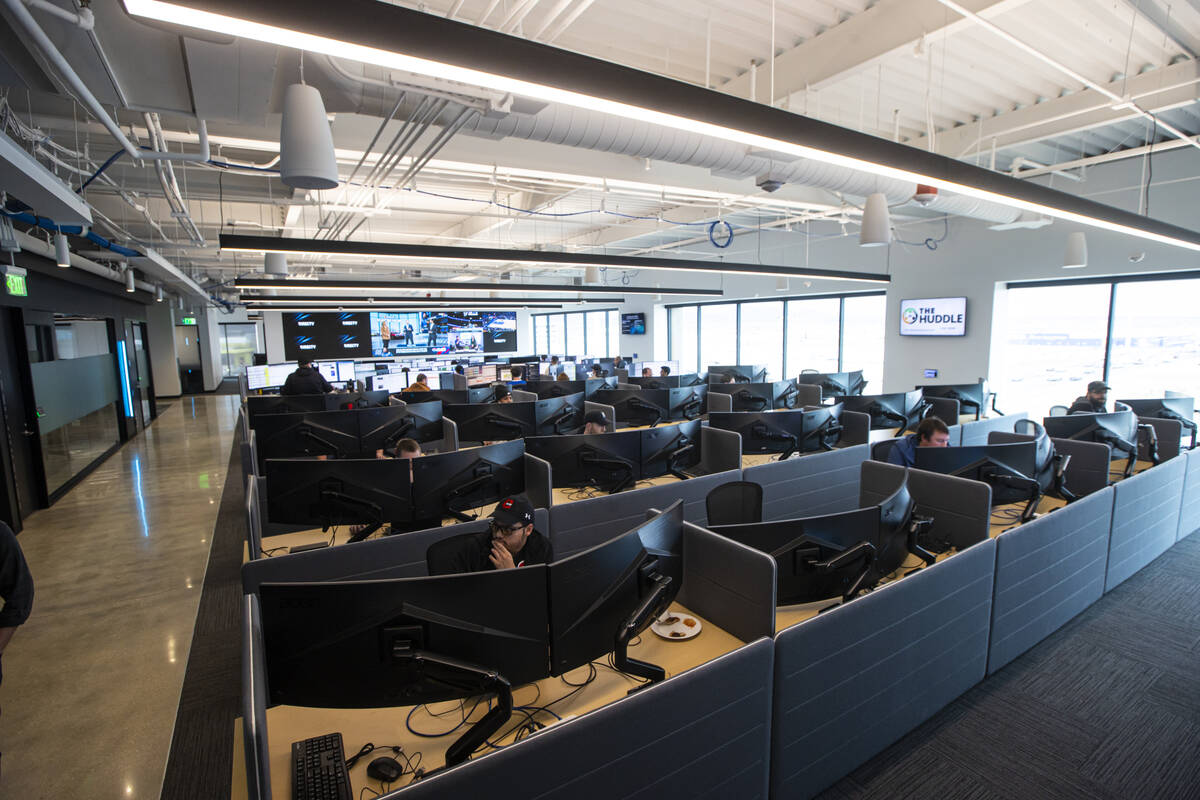 Traders work on computers during a tour of DraftKings' new offices at UnCommons on Tuesday, Mar ...