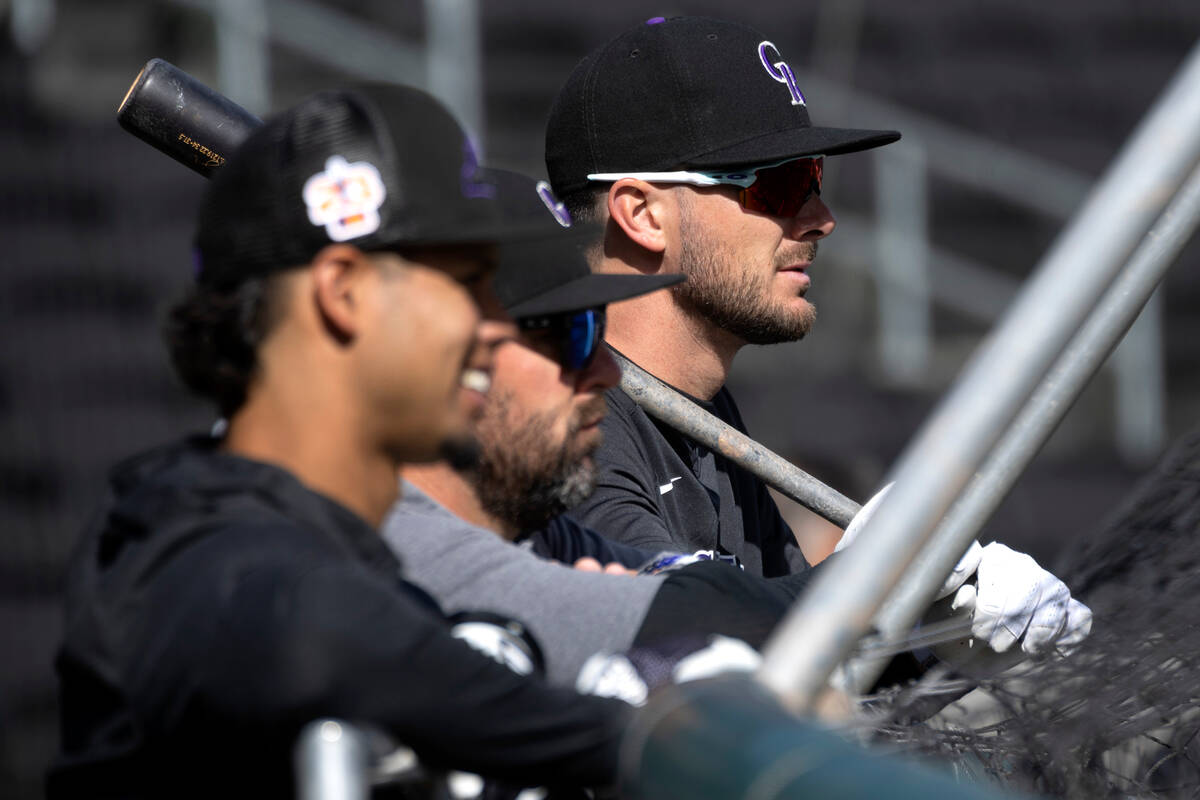 Kris Bryant of the Colorado Rockies watches batting practice before an MLB exhibition game betw ...