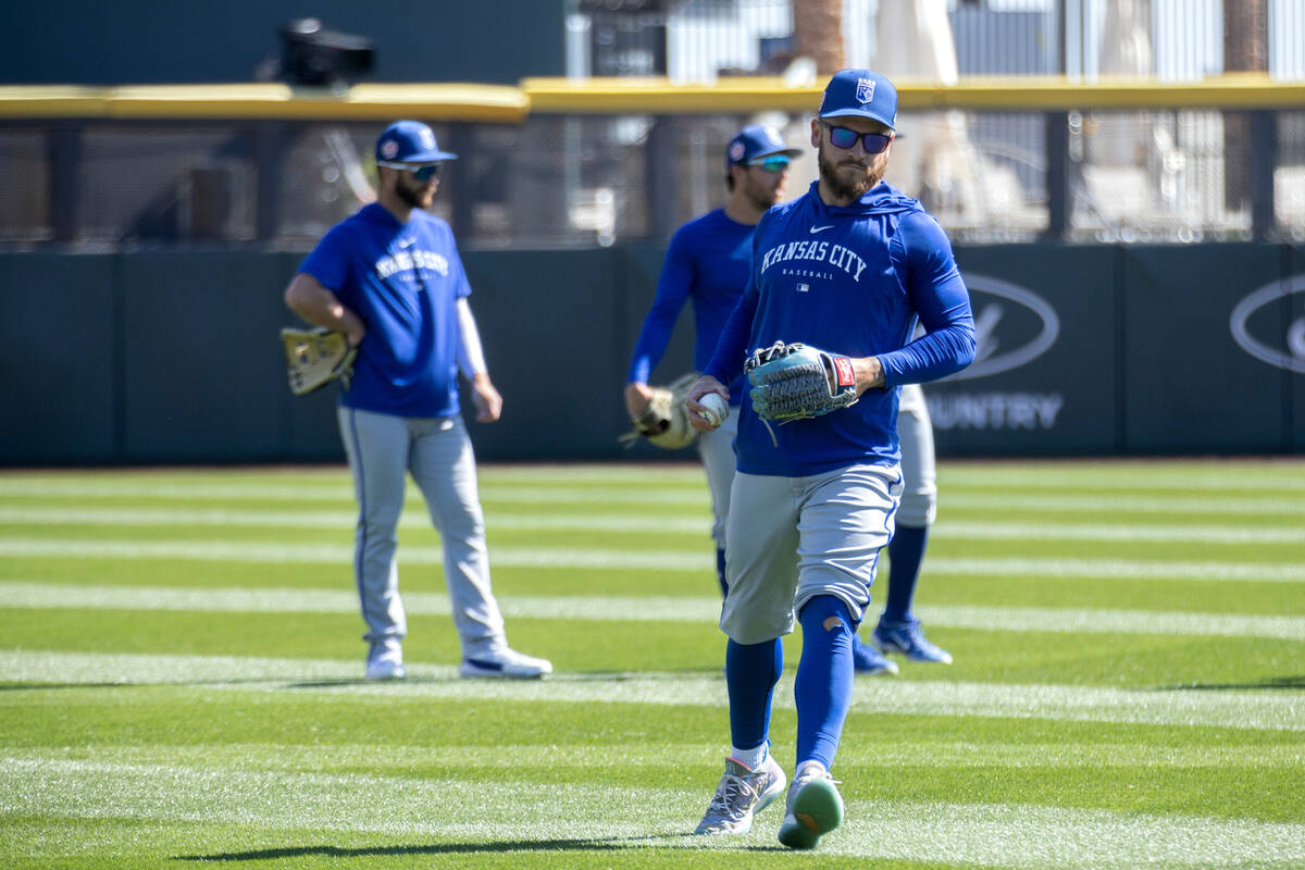 Kansas City Royals center fielder Kyle Isbell, who played baseball at UNLV, prepares to throw d ...