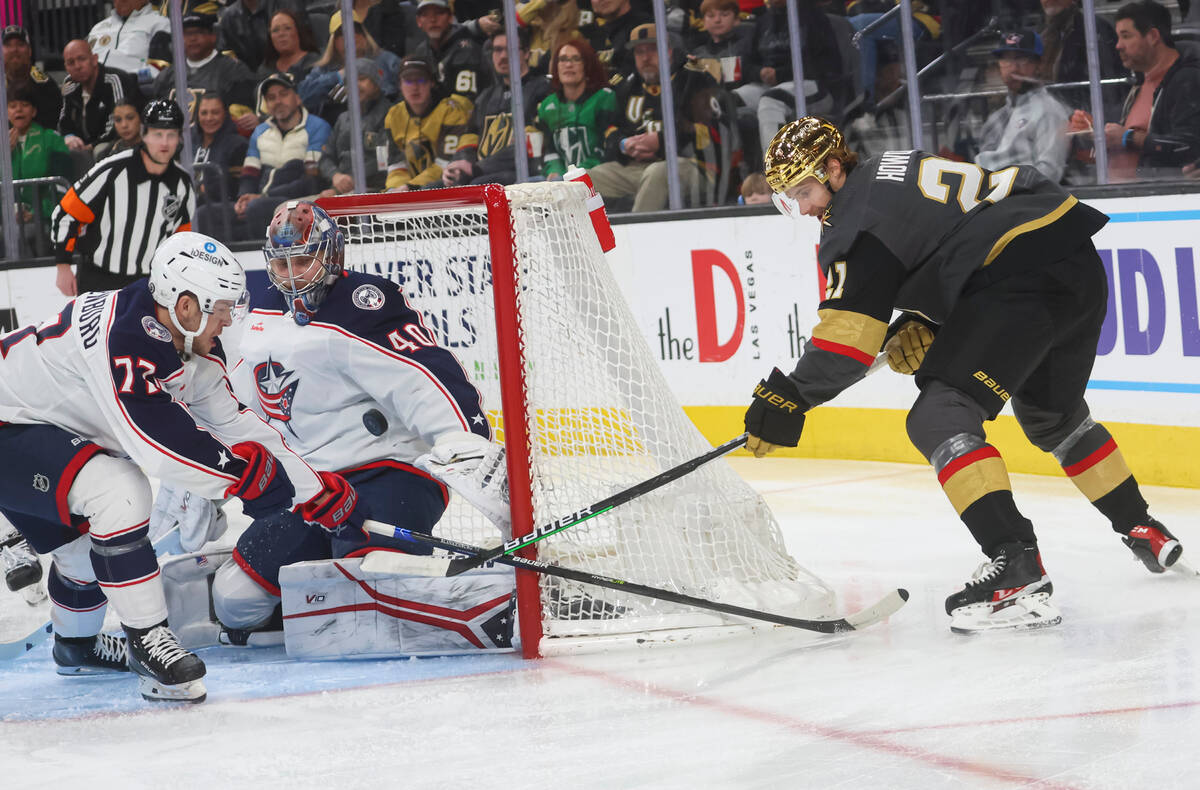 Columbus Blue Jackets goaltender Daniil Tarasov (40) blocks a shot from Golden Knights center B ...