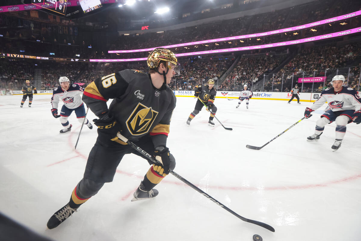 Golden Knights left wing Pavel Dorofeyev (16) skates with the puck against the Columbus Blue Ja ...