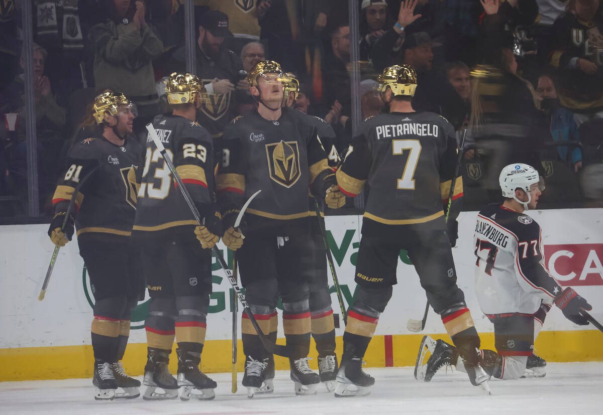 Golden Knights center Jack Eichel (9) looks at the replay after his second goal of the second p ...