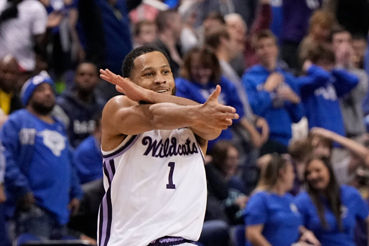 Kansas State guard Markquis Nowell celebrates after scoring against Kentucky during the second ...