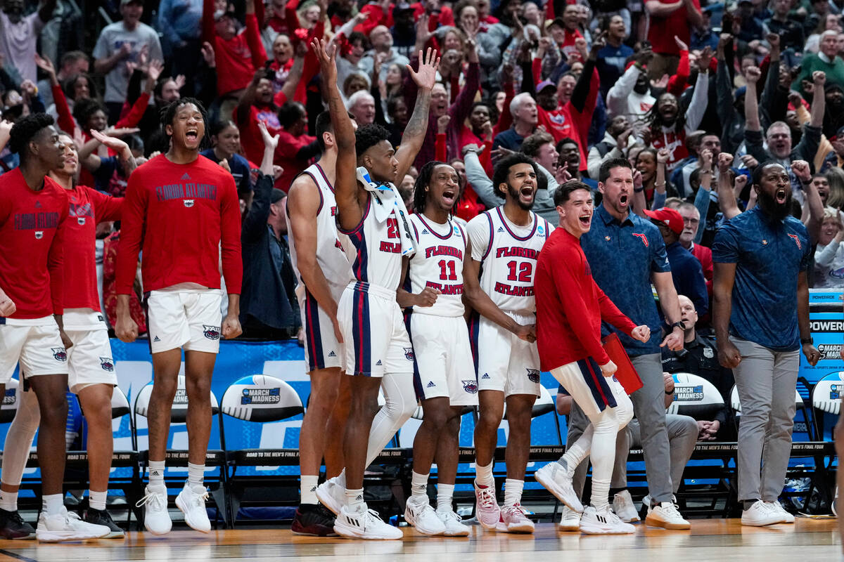 The Florida Atlantic bench celebrates in the second half of a second-round college basketball g ...