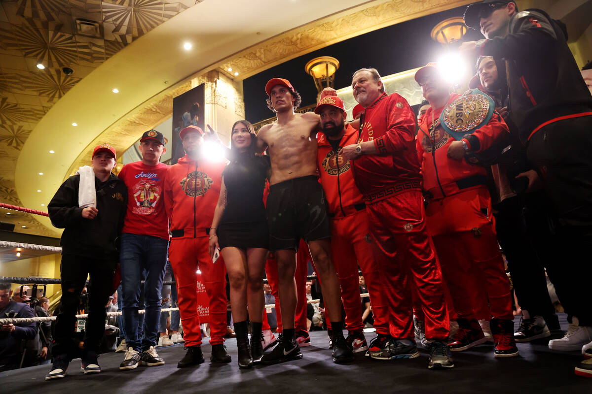 David Benavidez, center, poses with his team during an open workout event at the MGM Grand in L ...