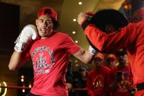 David Benavidez, left, works out in front of fans during an open workout event at the MGM Grand ...