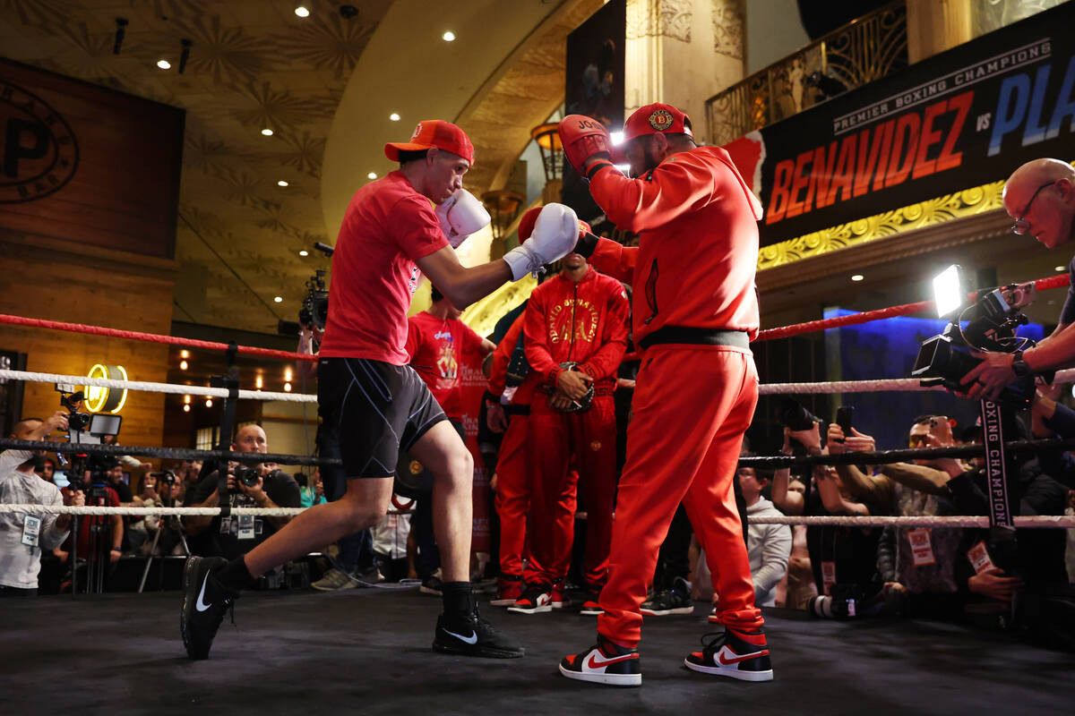 David Benavidez, left, works out in front of fans during an open workout event at the MGM Grand ...