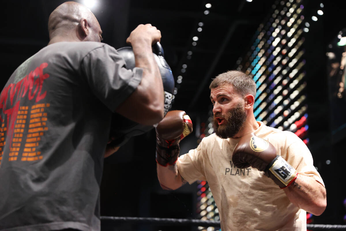 Caleb Plant, right, participates during a media workout at Culture Kings at The Forum Shops ins ...