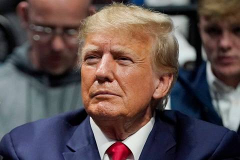 FILE - Former President Donald J. Trump watches the NCAA Wrestling Championships, Saturday, Mar ...