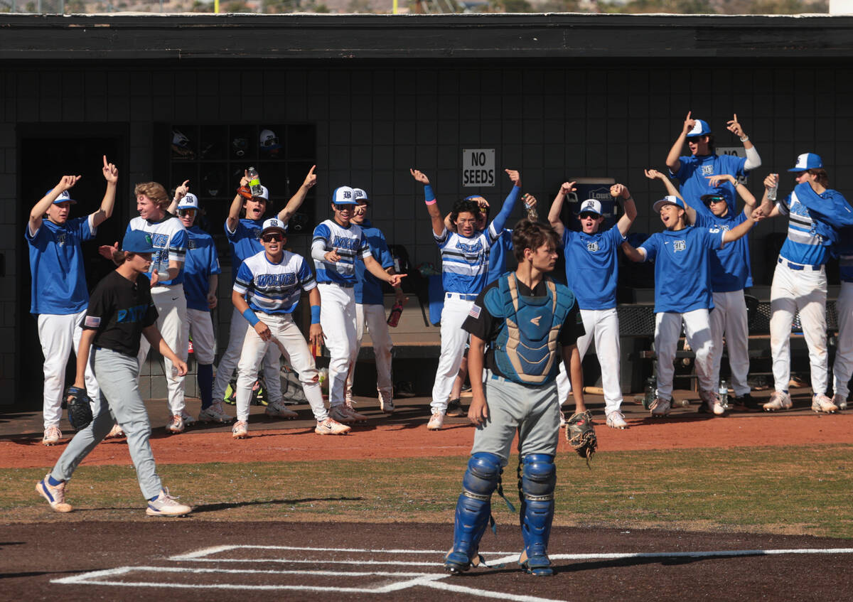 Basic players celebrate a run by Marcus Troyano (37) during a baseball game against Green Valle ...