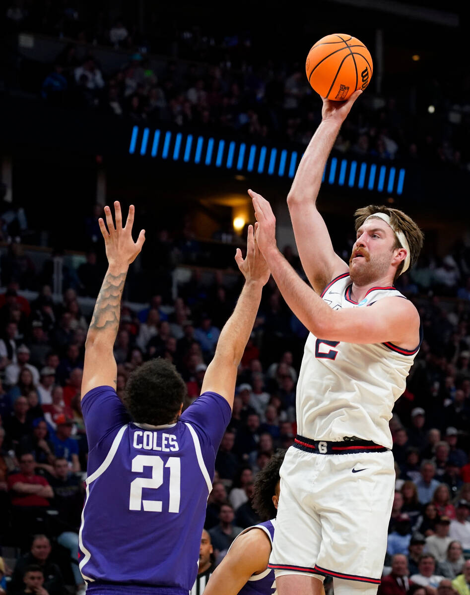Gonzaga forward Drew Timme shoots over TCU forward JaKobe Coles during the first half of a seco ...