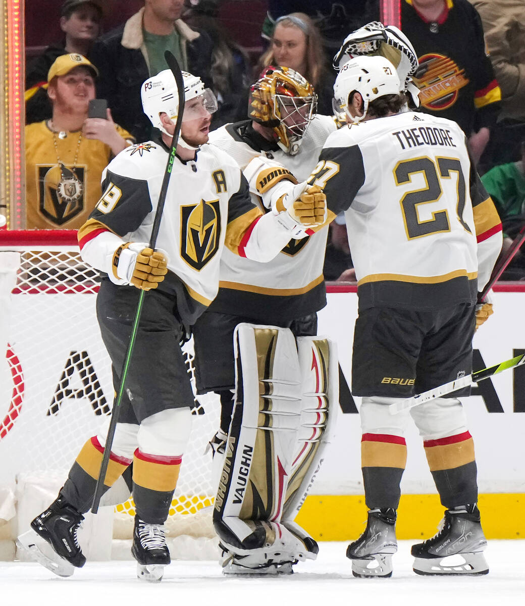 Vegas Golden Knights' Reilly Smith, Jonathan Quick and Shea Theodore, from left, celebrate the ...