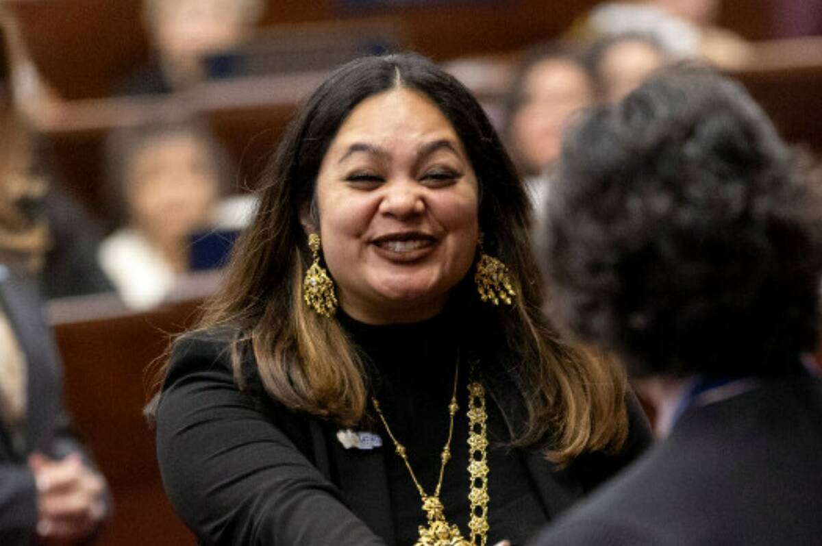 Assemblywoman Cecelia Gonzalez, D-Las Vegas, shakes the hand of Chief Justice Lidia S. Stiglich ...