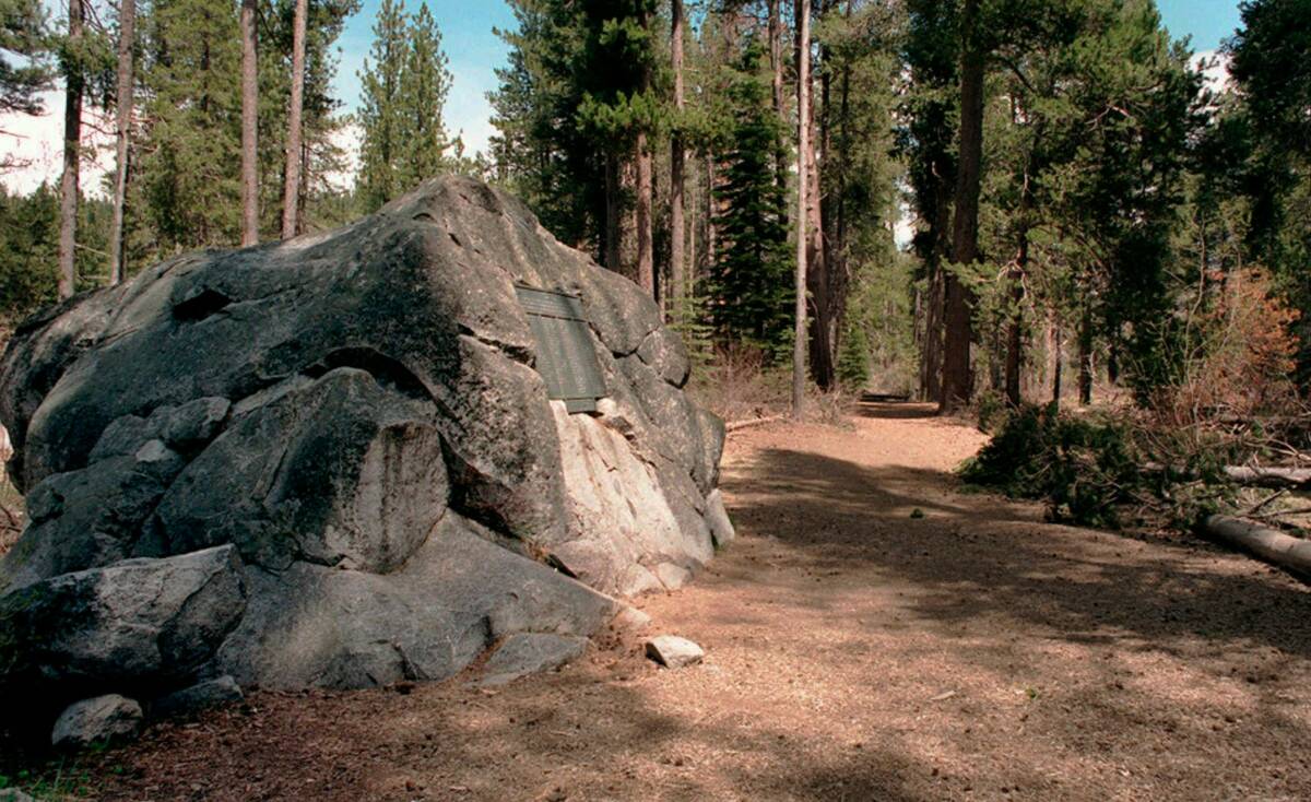 This boulder, shown in this undated file photo, served as one wall for the Murphy cabin at Donn ...