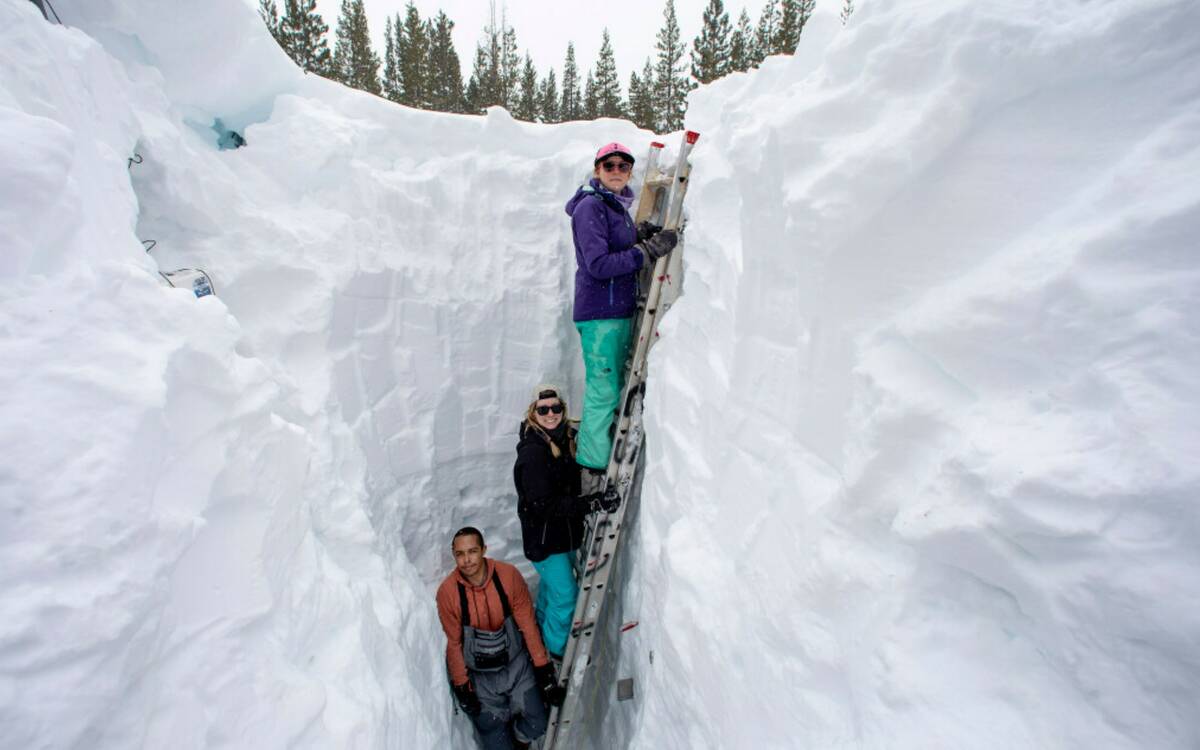 Working inside a nearly 18-foot-deep snow pit at the UC Berkeley Central Sierra Snow Lab, from ...