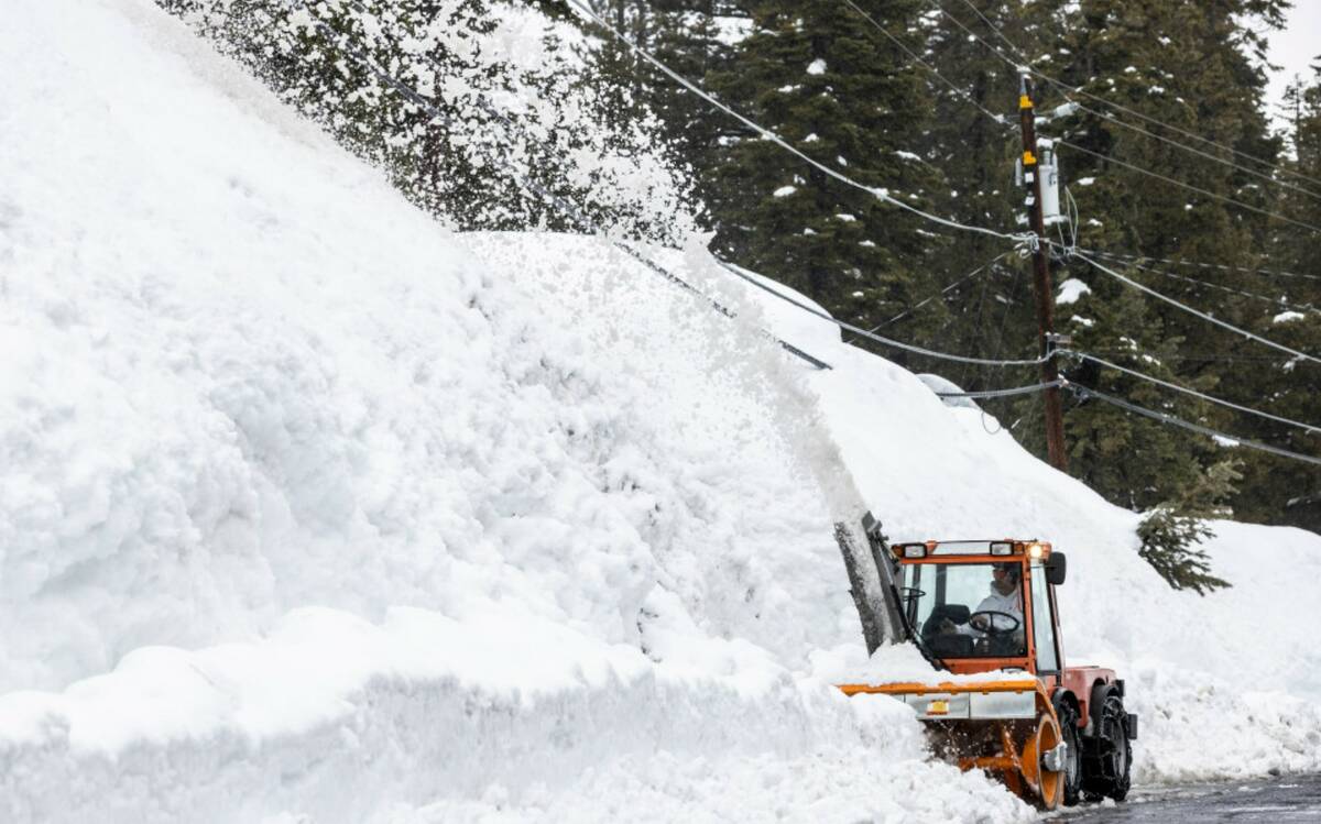 A snowblower removes snow in Tahoe City, Calif. Tuesday, March 14, 2023. (Stephen Lam/San Franc ...