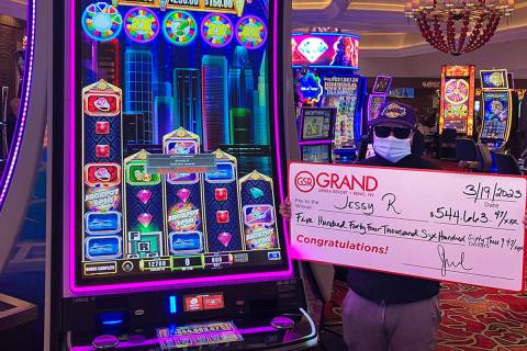 Jessy R. celebrates a $544,663 jackpot won on a Wheel of Fortune High Roller video slot game Su ...