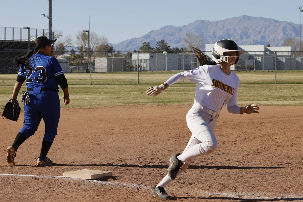 Eldorado's Erica Madrid runs to the plate after her inside-the-park home run during the second ...