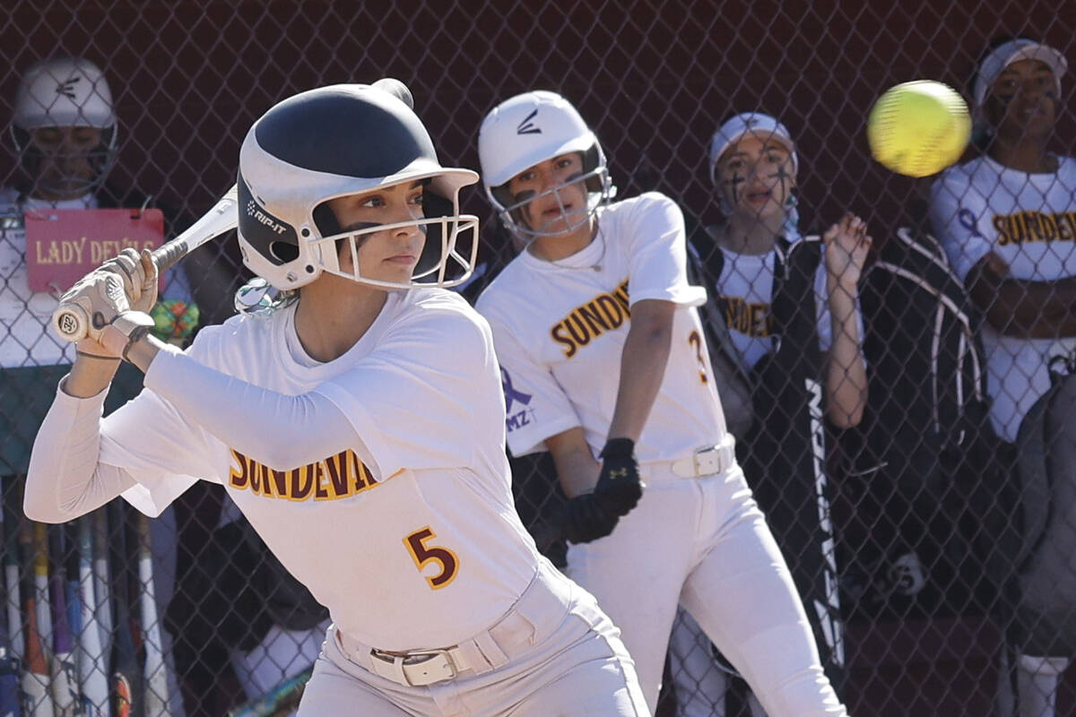 Eldorado pitcher Erica Madrid keeps her eye on the ball during the first inning of a softball g ...