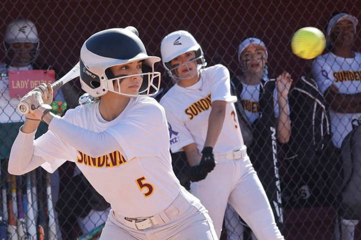 Eldorado pitcher Erica Madrid keeps her eye on the ball during the first inning of a softball g ...