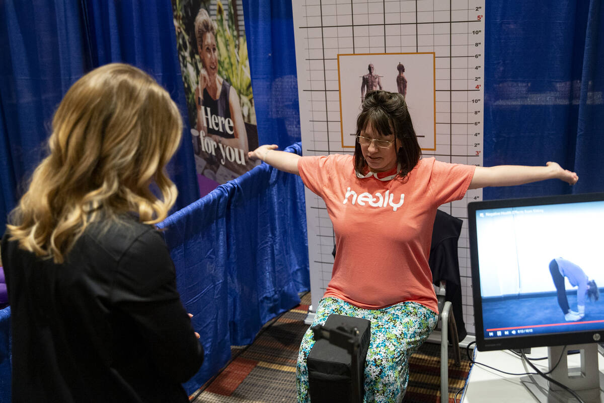 Kellie James participates in a posture evaluation with Amber Cherveny, clinic director at Egosc ...