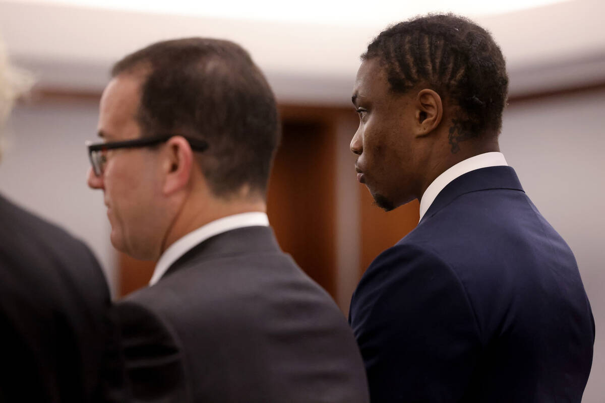 Former Raiders player Henry Ruggs, right, appears in court with one of his attorneys, Richard S ...