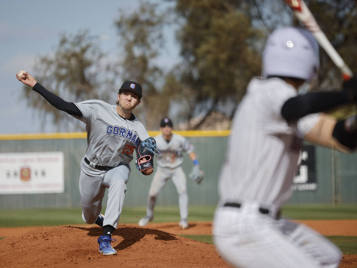 Bishop Gorman's Kamdyn Perry (25) delivers to Desert Oasis' Noah Griffith (17) during the first ...