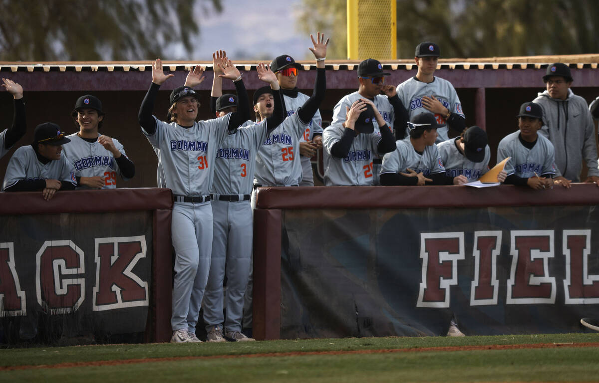 Bishop Gorman’s players cheer during the seventh inning of a baseball game against Deser ...